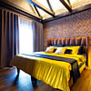 Apartmán 1 luxusní - ložnice s designovou postelí.